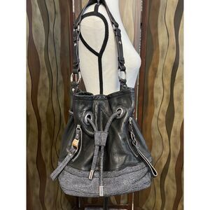B. Makowsky metallic leather snake print drawstring bucket/shoulder bag.